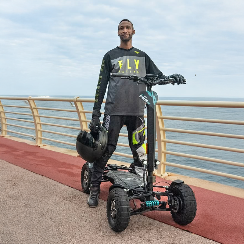 Aymard Vernay Riding MIA Four Scooter