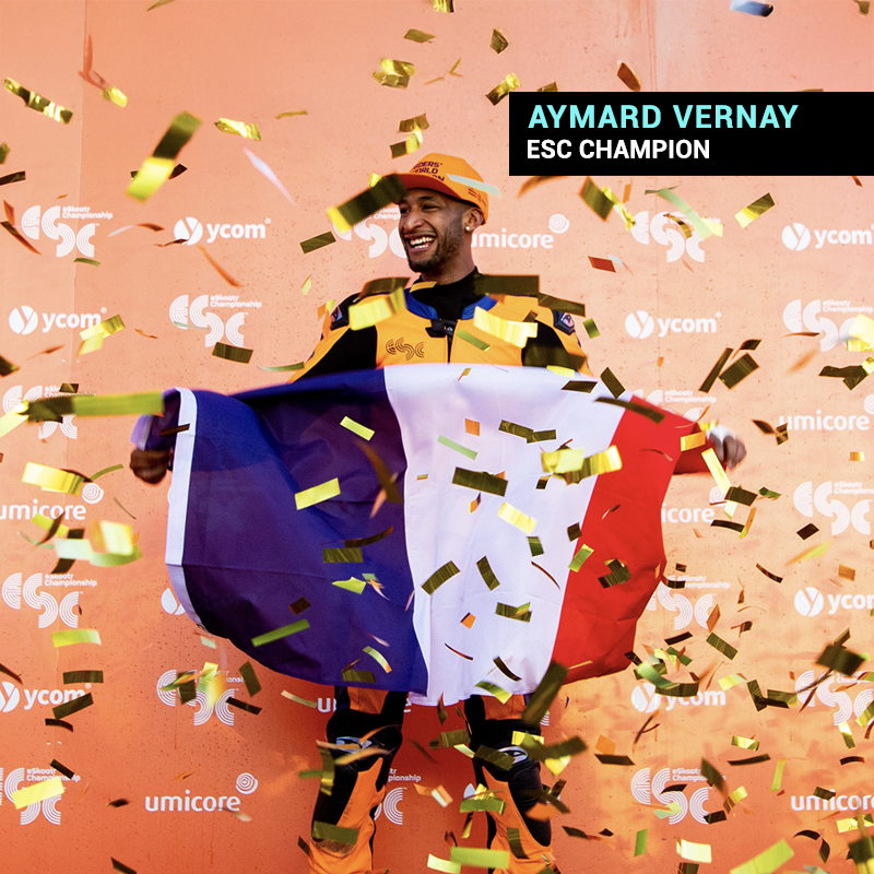 Aymard Vernay - ESC Champion Holding French Flag